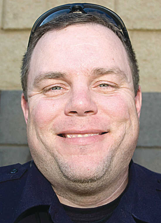 Mike Trim, police officer &quot;I&#39;m thankful for a good wife.&quot; [Order this photo] - 1769893-L